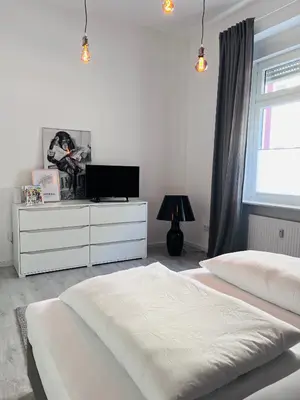 Ein Bett oder Betten in einem Zimmer der Unterkunft City nah wohnen in Wuppertal
