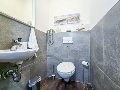 Ein Badezimmer in der Unterkunft Alpha Apartments