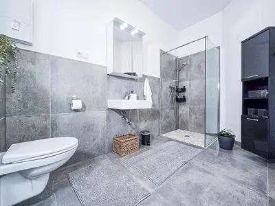 Ein Badezimmer in der Unterkunft Alpha Apartments