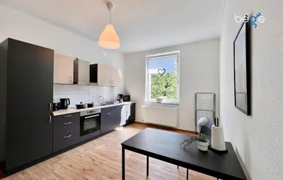 Küche/Küchenzeile in der Unterkunft BEGE APARTMENTS Coporate Haven
