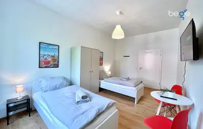 Ein Bett oder Betten in einem Zimmer der Unterkunft BEGE APARTMENTS Coporate Haven