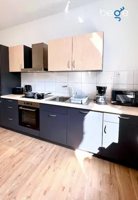 Küche/Küchenzeile in der Unterkunft BEGE APARTMENTS Coporate Haven