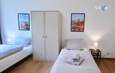 Ein Bett oder Betten in einem Zimmer der Unterkunft BEGE APARTMENTS Coporate Haven