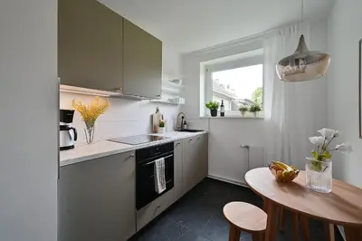 Küche/Küchenzeile in der Unterkunft City-Apartment für Gruppen Modern & Geräumig