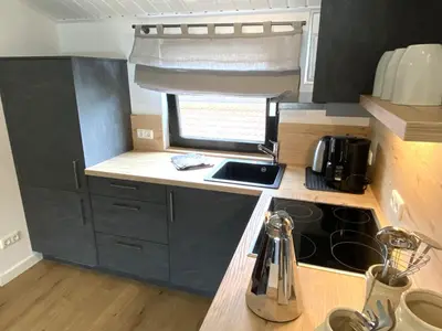 Küche/Küchenzeile in der Unterkunft Zentrales modernes Apartment, Nähe Zoo und Stadion