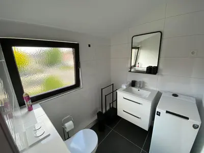 Ein Badezimmer in der Unterkunft Zentrales modernes Apartment, Nähe Zoo und Stadion