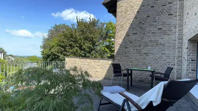 Ein Balkon oder eine Terrasse in der Unterkunft Komfortappartement mit Terraasse