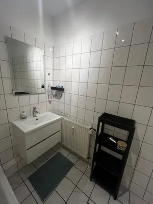 Ein Badezimmer in der Unterkunft Citynahes modernes Apartment