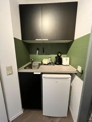 Küche/Küchenzeile in der Unterkunft Citynahes modernes Apartment