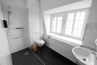Ein Badezimmer in der Unterkunft St. Barbara-Haus