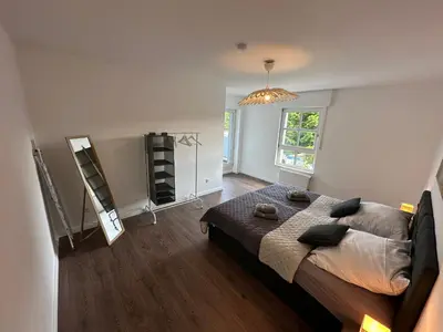Ein Bett oder Betten in einem Zimmer der Unterkunft TRAUMHAFT schöne Wohnung-nahe Volkspark Marl-MODERN-TOP Austattung-