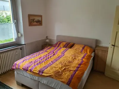 Ein Bett oder Betten in einem Zimmer der Unterkunft FeWo MaJo - Rustikal & entspannt Perfekt für Arbeit oder Auszeit