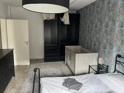 Ein Bett oder Betten in einem Zimmer der Unterkunft Geräumige, moderne 110 qm Wohnung Nähe Messe Essen