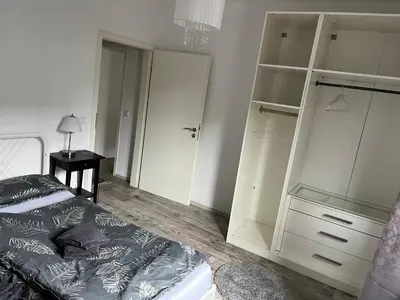 Ein Bett oder Betten in einem Zimmer der Unterkunft Geräumige, moderne 110 qm Wohnung Nähe Messe Essen