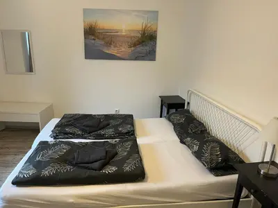 Ein Bett oder Betten in einem Zimmer der Unterkunft Geräumige, moderne 110 qm Wohnung Nähe Messe Essen