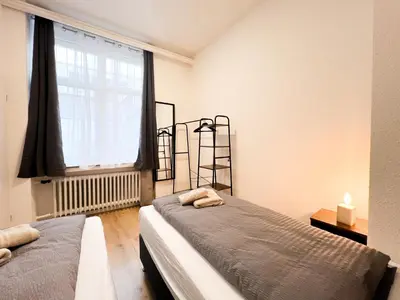 Ein Bett oder Betten in einem Zimmer der Unterkunft Vibehome Düsseldorf - Little Tokyo