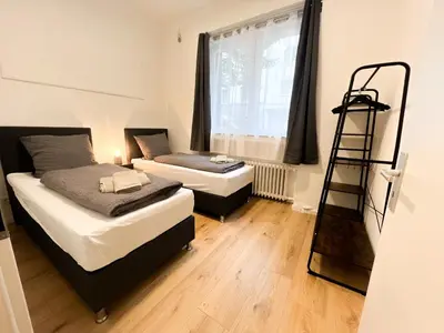 Ein Bett oder Betten in einem Zimmer der Unterkunft Vibehome Düsseldorf - Little Tokyo