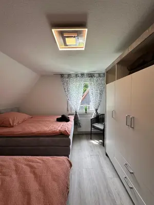 Ein Bett oder Betten in einem Zimmer der Unterkunft Zur schönen Aussicht I 80 m2 I Am Wald I Zuhause