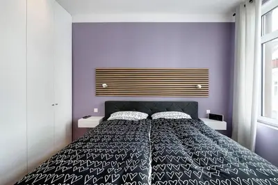 Ein Bett oder Betten in einem Zimmer der Unterkunft Ferienwohnung Nippesstr 17 in Ohligs