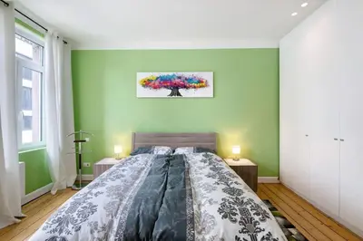 Ein Bett oder Betten in einem Zimmer der Unterkunft Ferienwohnung Nippesstr 17 in Ohligs