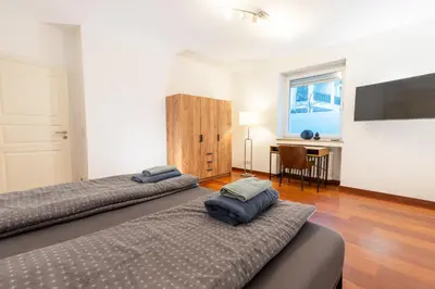 Ein Bett oder Betten in einem Zimmer der Unterkunft Rhine Apartment