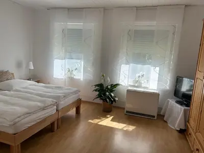 Ein Bett oder Betten in einem Zimmer der Unterkunft Casa Commodore Nähe Messe Düsseldorf