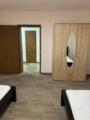 Ein Bett oder Betten in einem Zimmer der Unterkunft Laras voll ausgestattete Gartenwohnung mit WLAN und TV