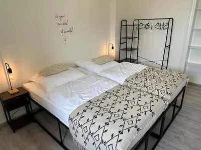 Ein Bett oder Betten in einem Zimmer der Unterkunft FeWo Topnik