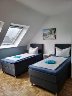 Ein Bett oder Betten in einem Zimmer der Unterkunft Näher Messe und Flughafen 3