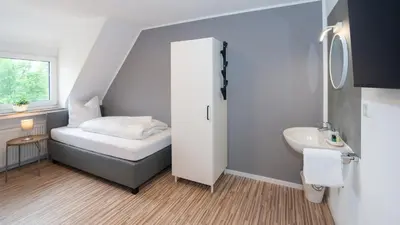 Ein Bett oder Betten in einem Zimmer der Unterkunft ERSTAY - moderne Zimmer