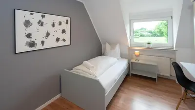 Ein Bett oder Betten in einem Zimmer der Unterkunft ERSTAY - moderne Zimmer