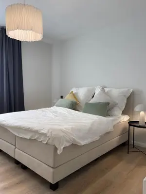 Ein Bett oder Betten in einem Zimmer der Unterkunft Pure Stay