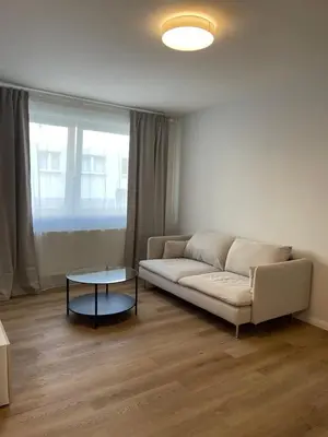 Ein Sitzbereich in der Unterkunft Pure Stay