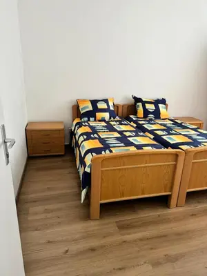 Ein Bett oder Betten in einem Zimmer der Unterkunft Ferienwohnung Grundstein