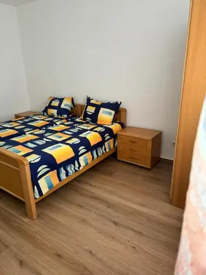 Ein Bett oder Betten in einem Zimmer der Unterkunft Ferienwohnung Grundstein