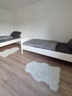 Ein Bett oder Betten in einem Zimmer der Unterkunft MaxMir - Tannenweg Iserlohn