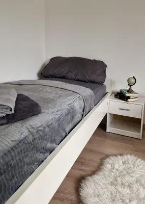 Ein Bett oder Betten in einem Zimmer der Unterkunft MaxMir - Tannenweg Iserlohn
