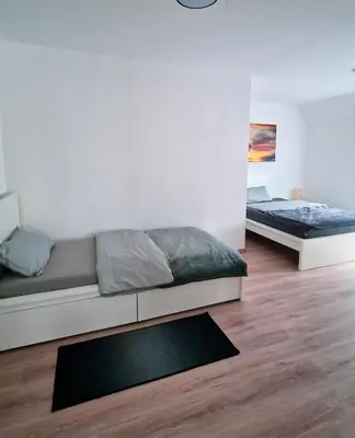 Ein Bett oder Betten in einem Zimmer der Unterkunft MaxMir - Tannenweg Iserlohn