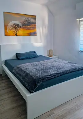 Ein Bett oder Betten in einem Zimmer der Unterkunft MaxMir - Tannenweg Iserlohn