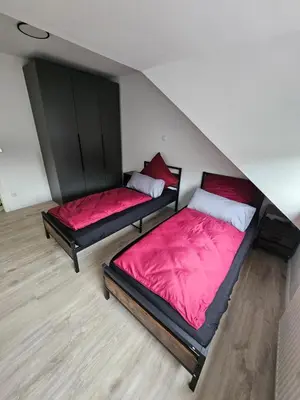 Ein Bett oder Betten in einem Zimmer der Unterkunft Emmi
