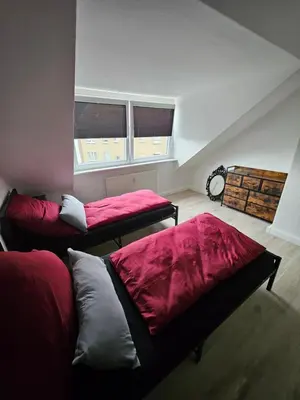 Ein Bett oder Betten in einem Zimmer der Unterkunft Emmi