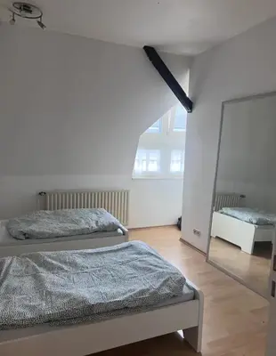 Ein Bett oder Betten in einem Zimmer der Unterkunft Appartement 100m2