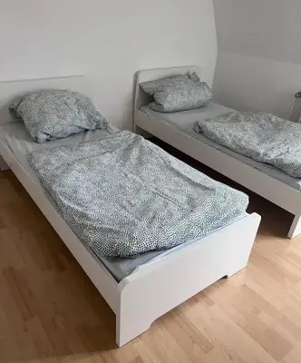 Ein Bett oder Betten in einem Zimmer der Unterkunft Appartement 100m2