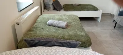 Ein Bett oder Betten in einem Zimmer der Unterkunft TOPFLAT mit Küche I gratis Parkplatz I drei Schlafzimmer I zentrumnah