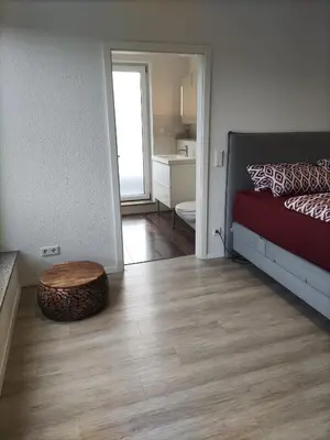 Ein Bett oder Betten in einem Zimmer der Unterkunft Luxuriöse, große Wohnung mit Parkblick