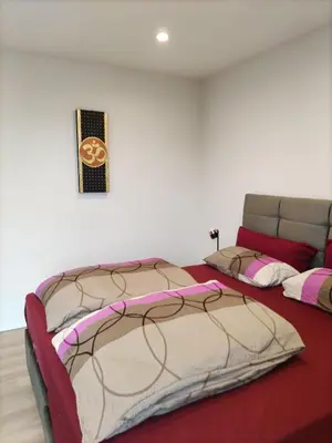 Ein Bett oder Betten in einem Zimmer der Unterkunft Luxuriöse, große Wohnung mit Parkblick