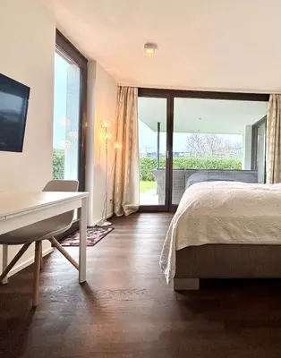 Ein Bett oder Betten in einem Zimmer der Unterkunft Studio Apartment direkt am Phoenixsee
