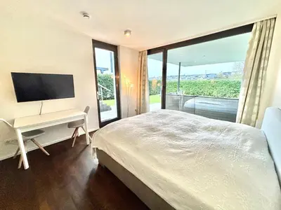 Ein Bett oder Betten in einem Zimmer der Unterkunft Studio Apartment direkt am Phoenixsee