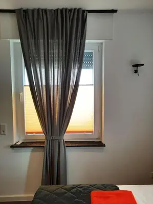 Ein Bett oder Betten in einem Zimmer der Unterkunft Zentral-kostenloses Parken-Mediapaket-Balkon-EN5