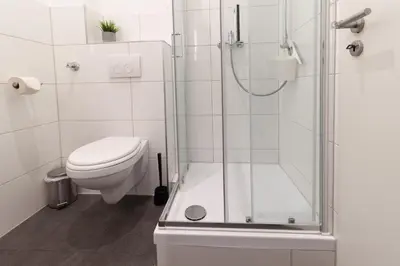 Ein Badezimmer in der Unterkunft Modern, komfortabel, vollausgestattet - Apartments by mevoga